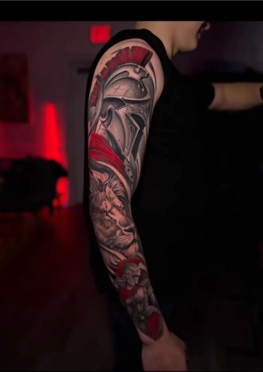 Ver detalles: Juan Russo Tattoo, Tatuaje